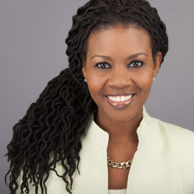 Headshot of Dr. Lucas wearing a white jacket