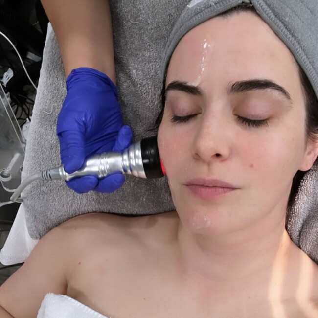 A woman receives a facial treatment at the New Jersey Acupuncture Center