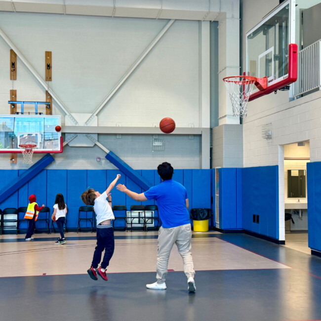 People playing basketball in the gym