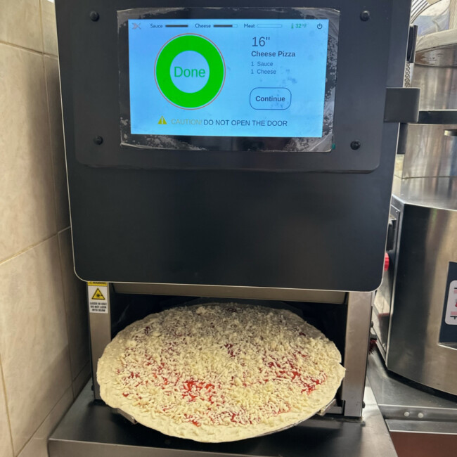 Pizza robot with cheese pizza